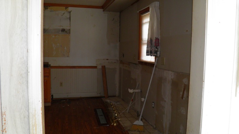 Kitchen had no cabinets.