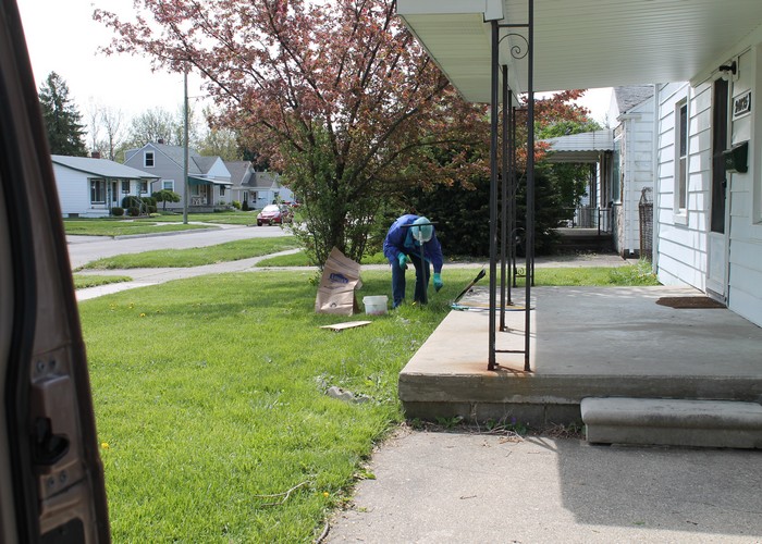 Mom working to help clean up the yard.