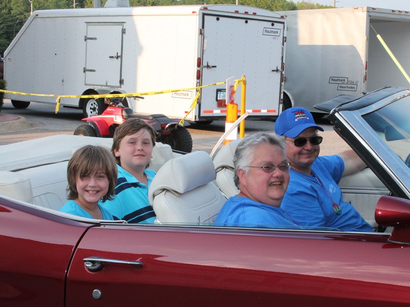 John (flash) and Joan in Joans 1972 Malibu Convertible.
Who's that in the back seat ? Looks like my kids, Leah and Jacob.