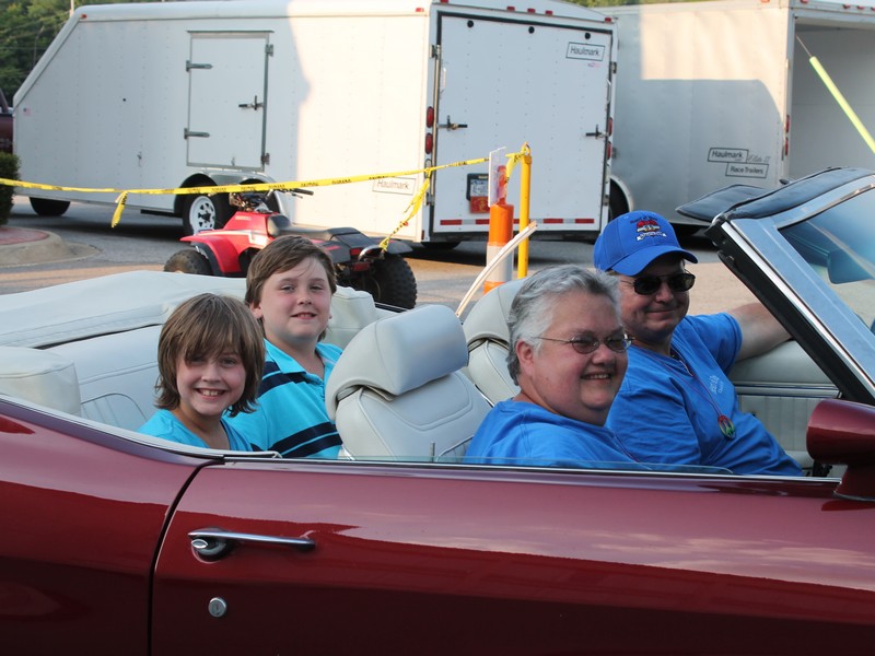 John (flash) and Joan in Joans 1972 Malibu Convertible. 
Who's that in the back seat ?  Looks like my kids, Leah and Jacob.