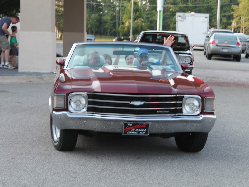 John (flash) and Joan in Joans 1972 Malibu Convertible.