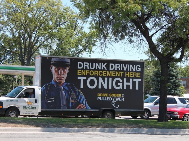Like any of the Classic car drivers would drive drunk. Yeah right...not in the classic. Billboards like this are popular advertising on Woodward.