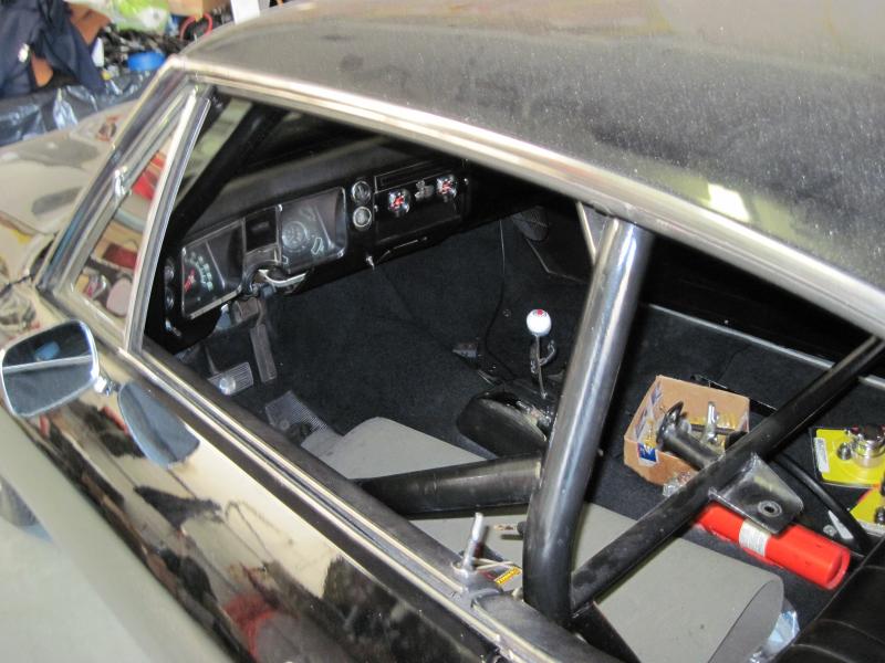 IMG 0360
This was my childhood buds car he found a picture of me under the dash when I was 18 (now 52 lol) installing a sun oil pressure gauge in the middle of that fake clock you can see it in the pic