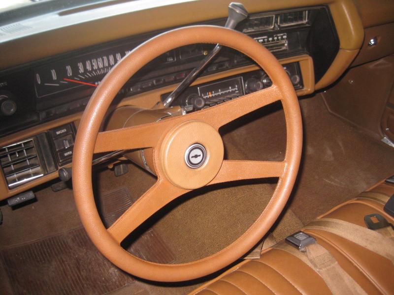 Period correct 4-spoke Sport Wheel.