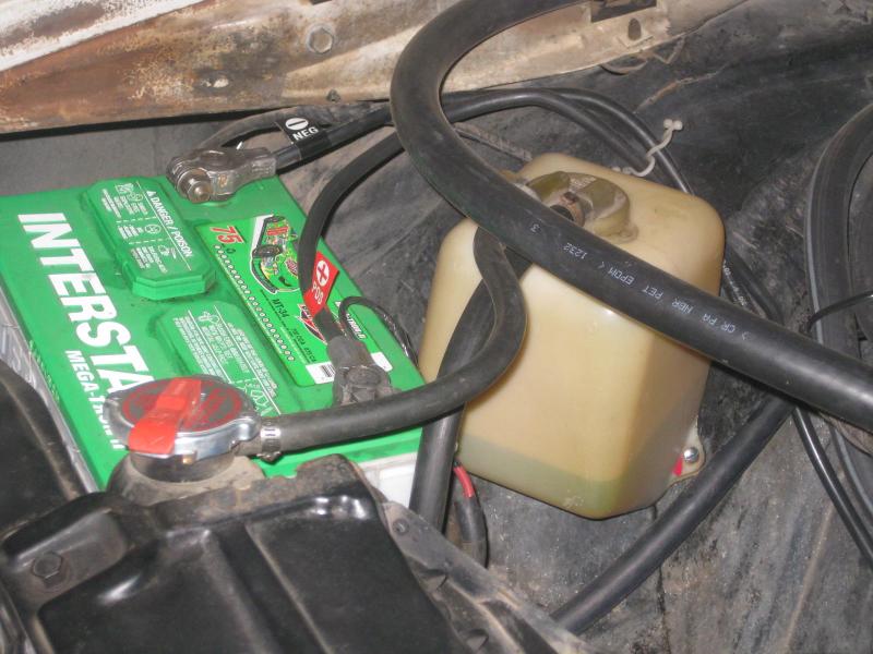 1970 Skylark Washer Bottle with the lid from a 1985 Riviera overflow bottle. Thes lids fit most GM washer bottles and makes it easy to convert them to an overflow bottle. This on fits nicely on the passenger inner fender.